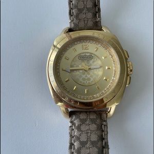 Coach yellow gold watch